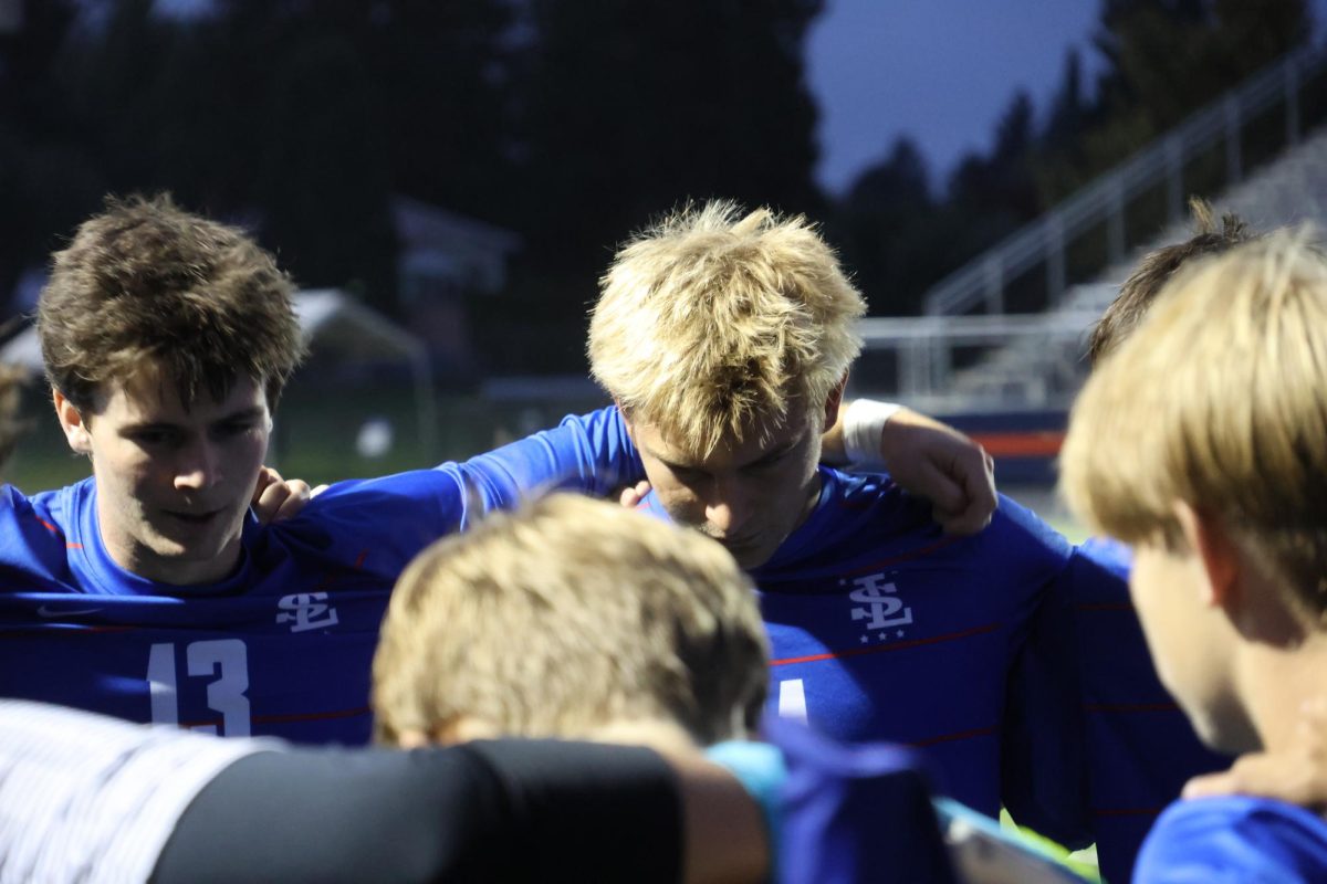 To develop their chemistry as a team, members of the varsity boys soccer team do simple things that they said make a difference, like matching on game days, greeting each other in the hallway, and listening to music together. 