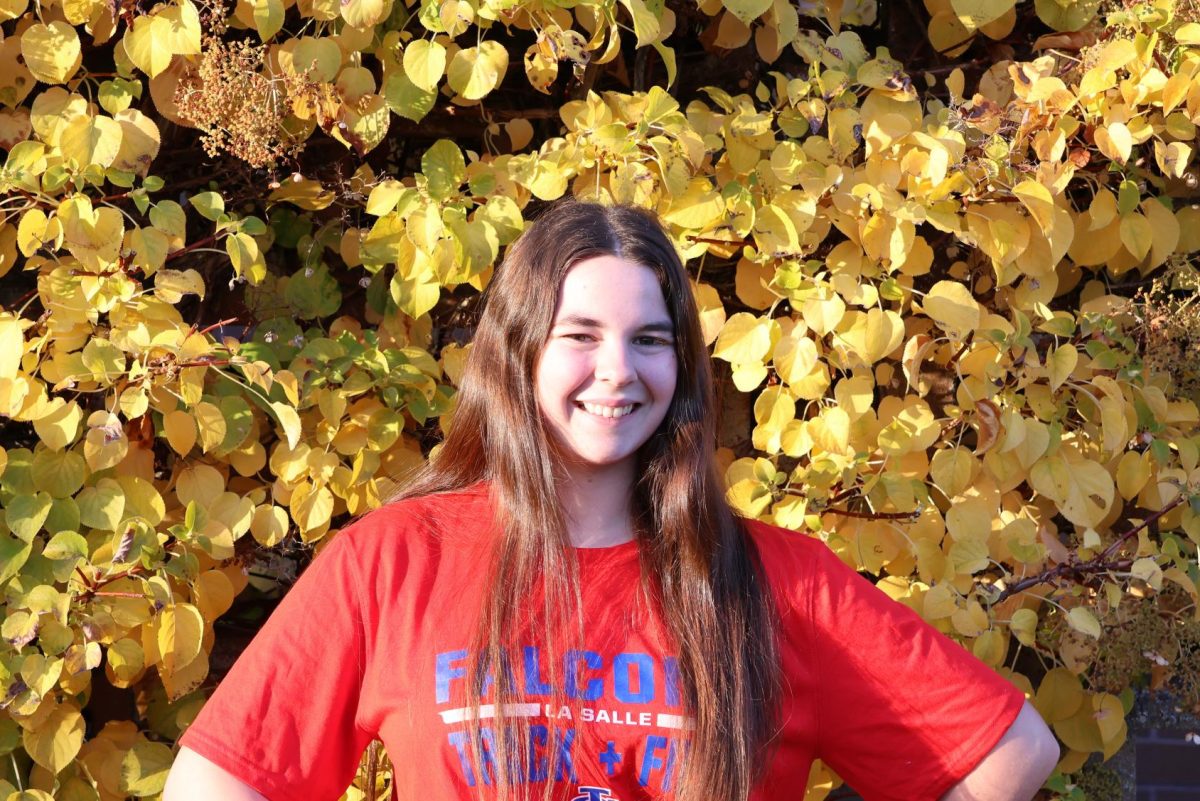 During practice, senior Mady Lifshutz said she “does a little bit of everything” — tumbling, stunting, and preparing various halftime routines and cheers.