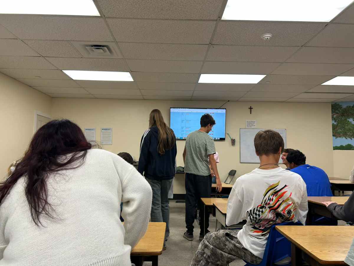 Students took their seats to hear about the organization Dandelion House. 