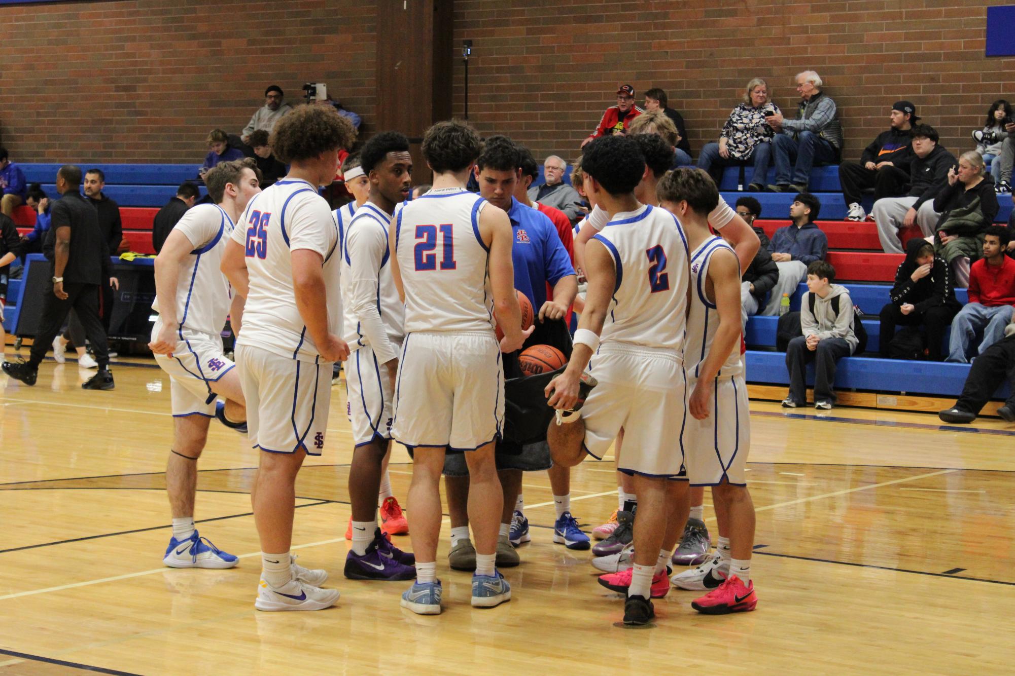 Photo Story: Falcons Varsity Boys Basketball Fall Short 54–36 Against Centennial