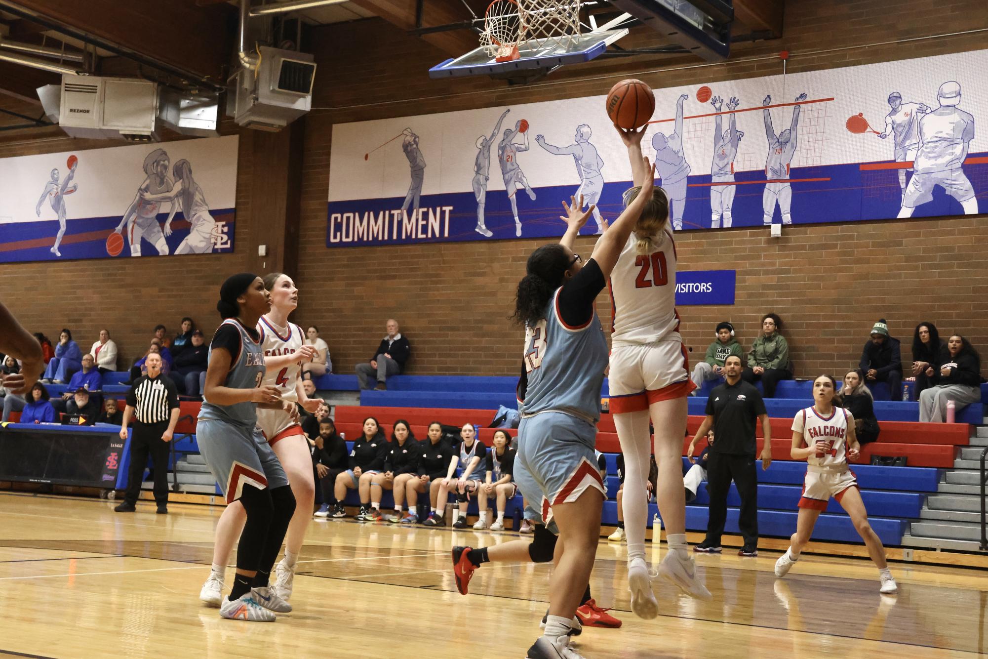 Photo Story: Falcons Girls Basketball Steamroll Eagles 61-28 at Home
