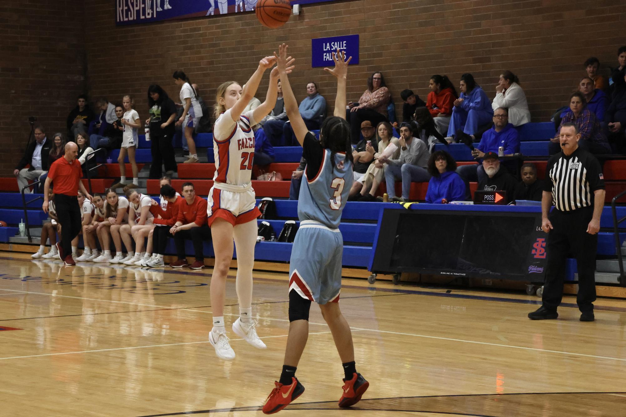 Photo Story: Falcons Girls Basketball Steamroll Eagles 61-28 at Home