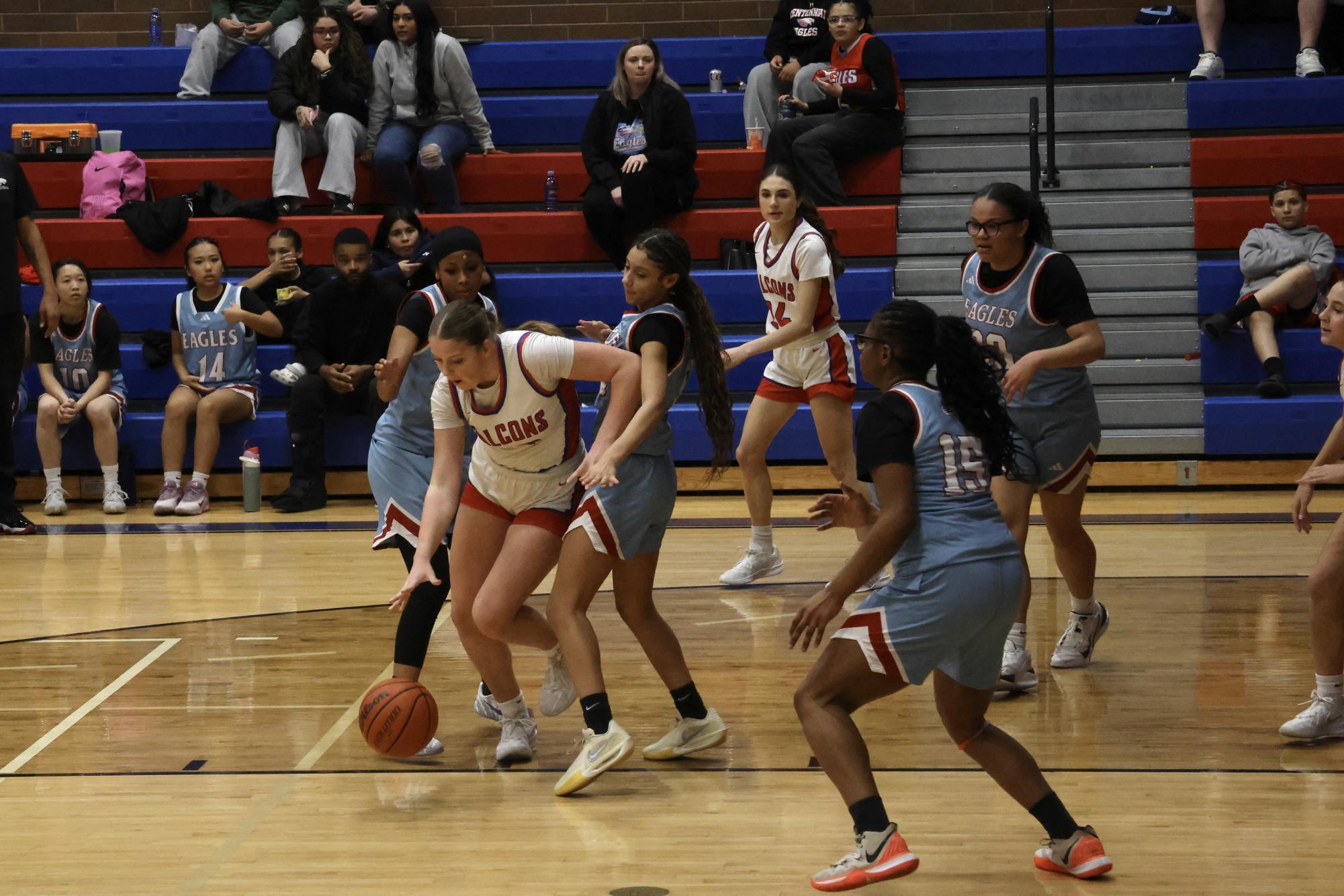 Photo Story: Falcons Girls Basketball Steamroll Eagles 61-28 at Home