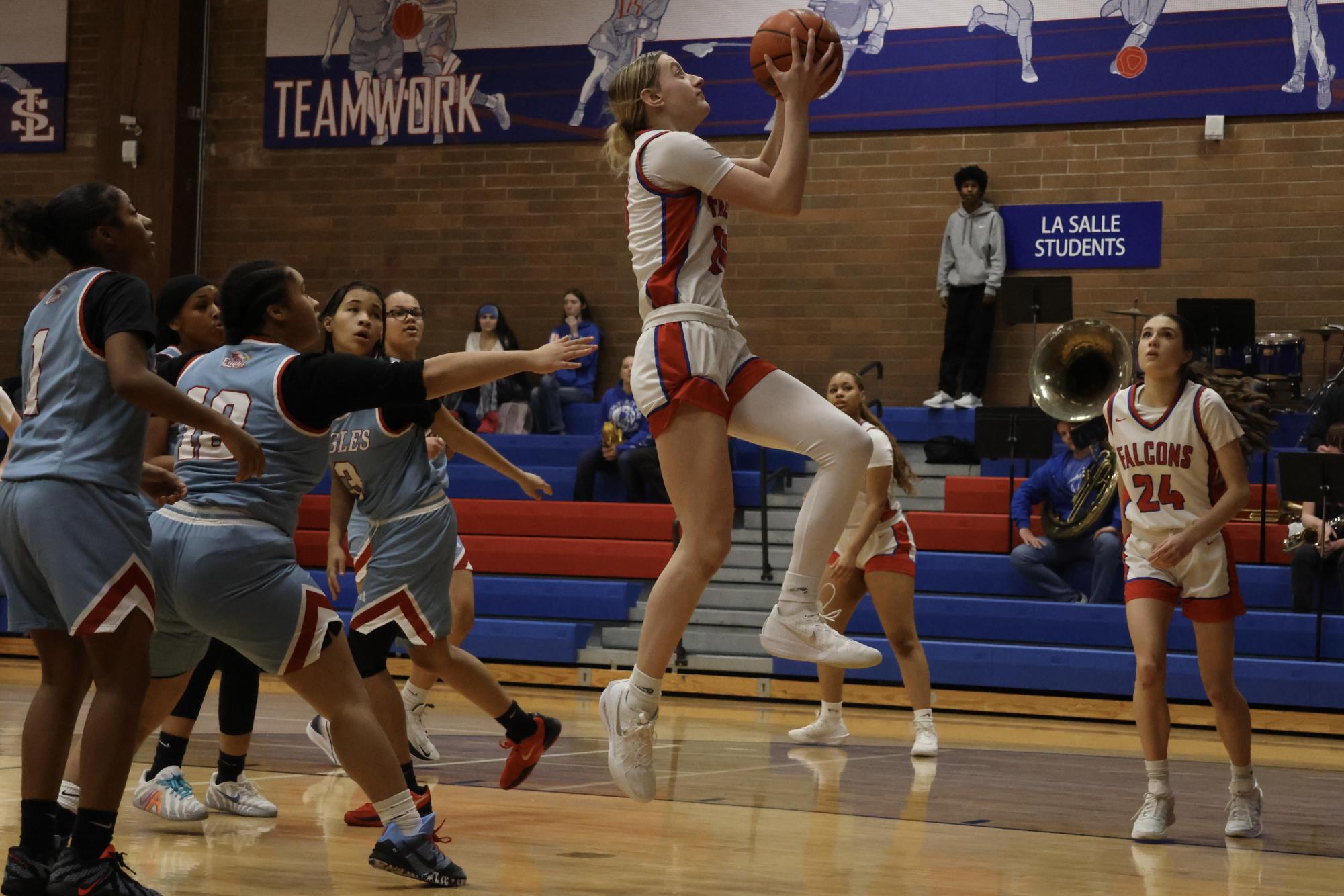 Photo Story: Falcons Girls Basketball Steamroll Eagles 61-28 at Home
