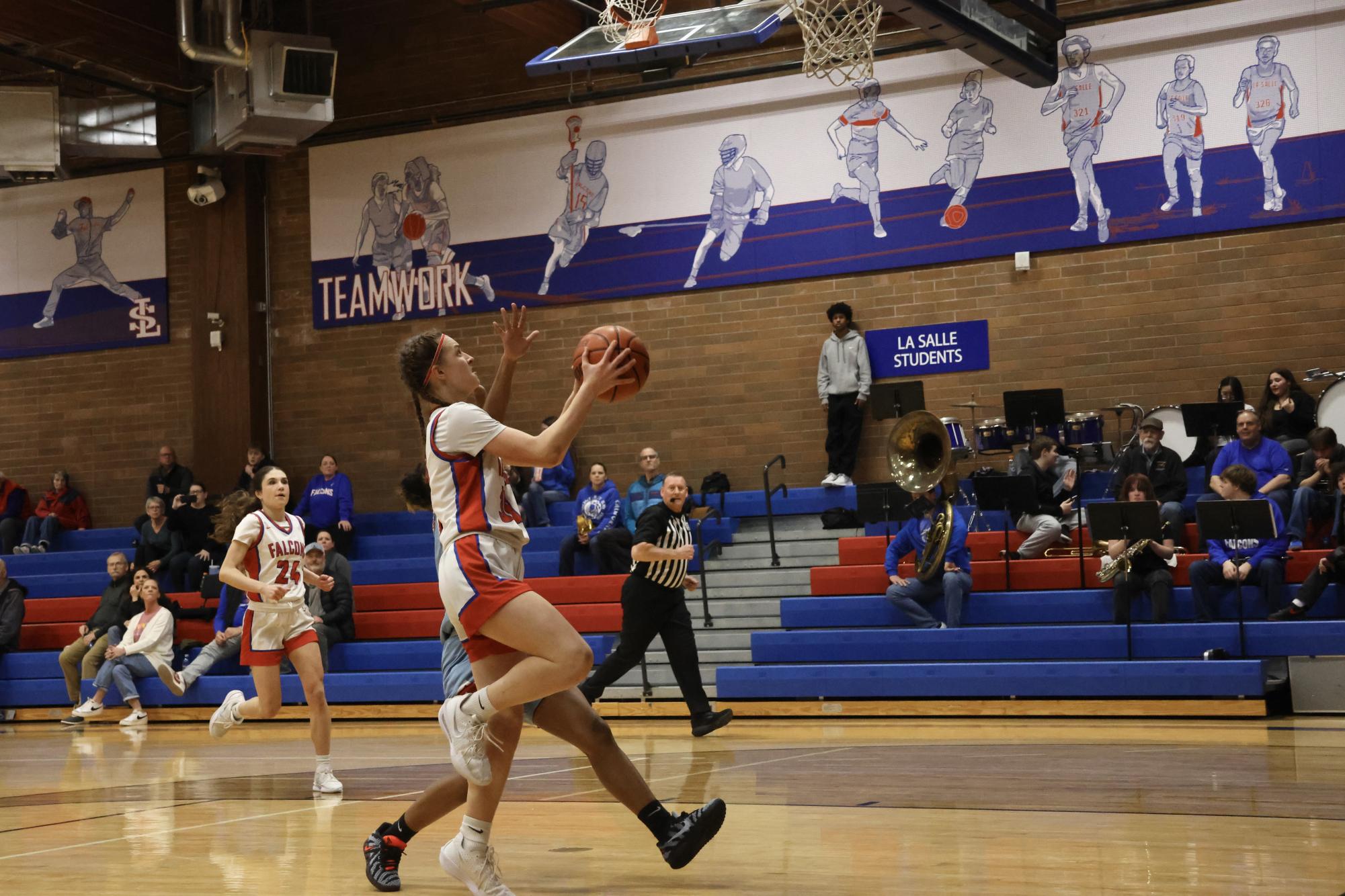 Photo Story: Falcons Girls Basketball Steamroll Eagles 61-28 at Home