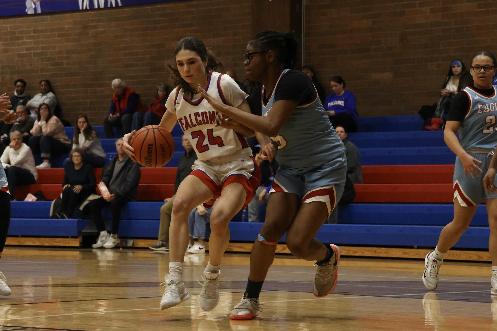 Photo Story: Falcons Girls Basketball Steamroll Eagles 61-28 at Home