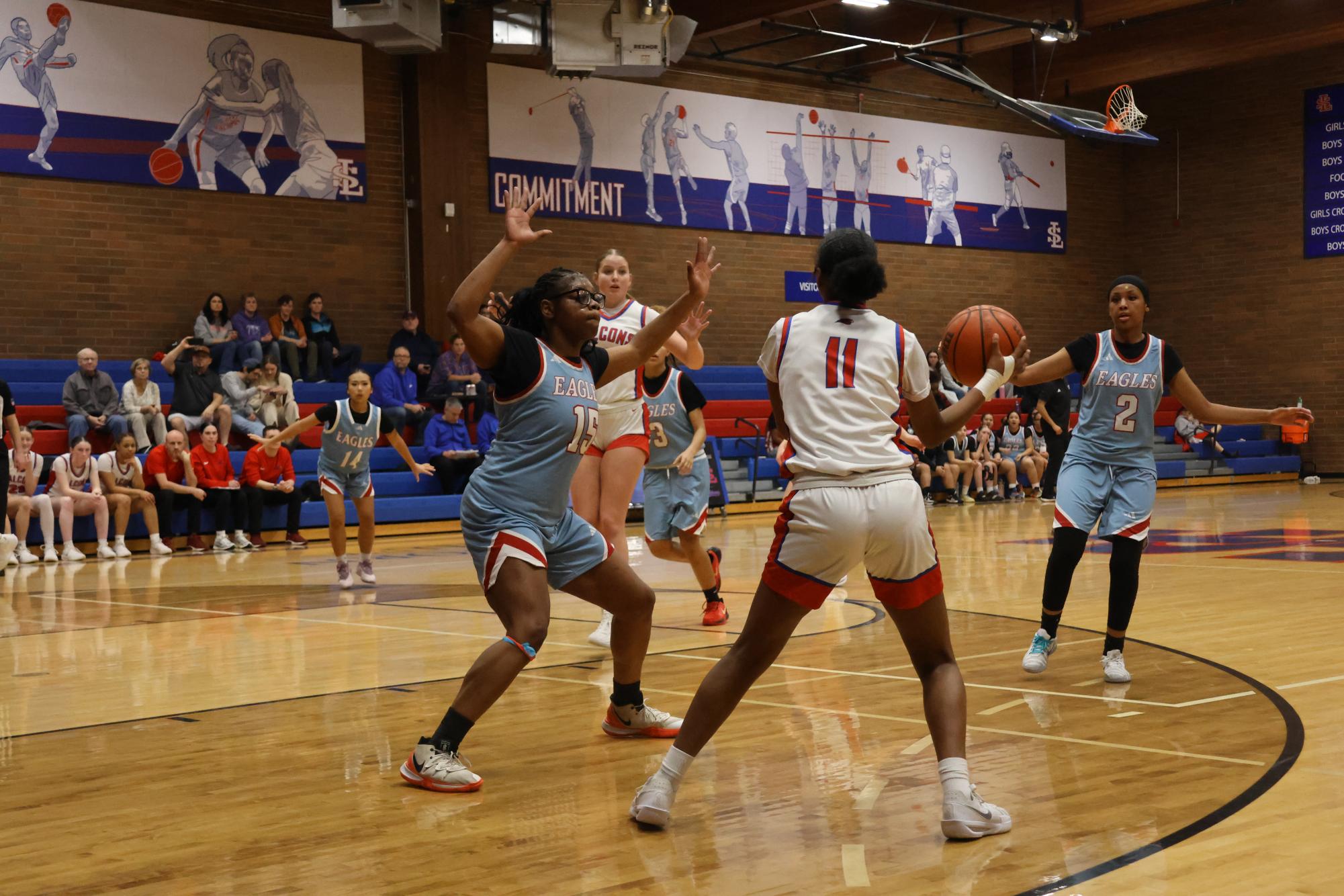 Photo Story: Falcons Girls Basketball Steamroll Eagles 61-28 at Home