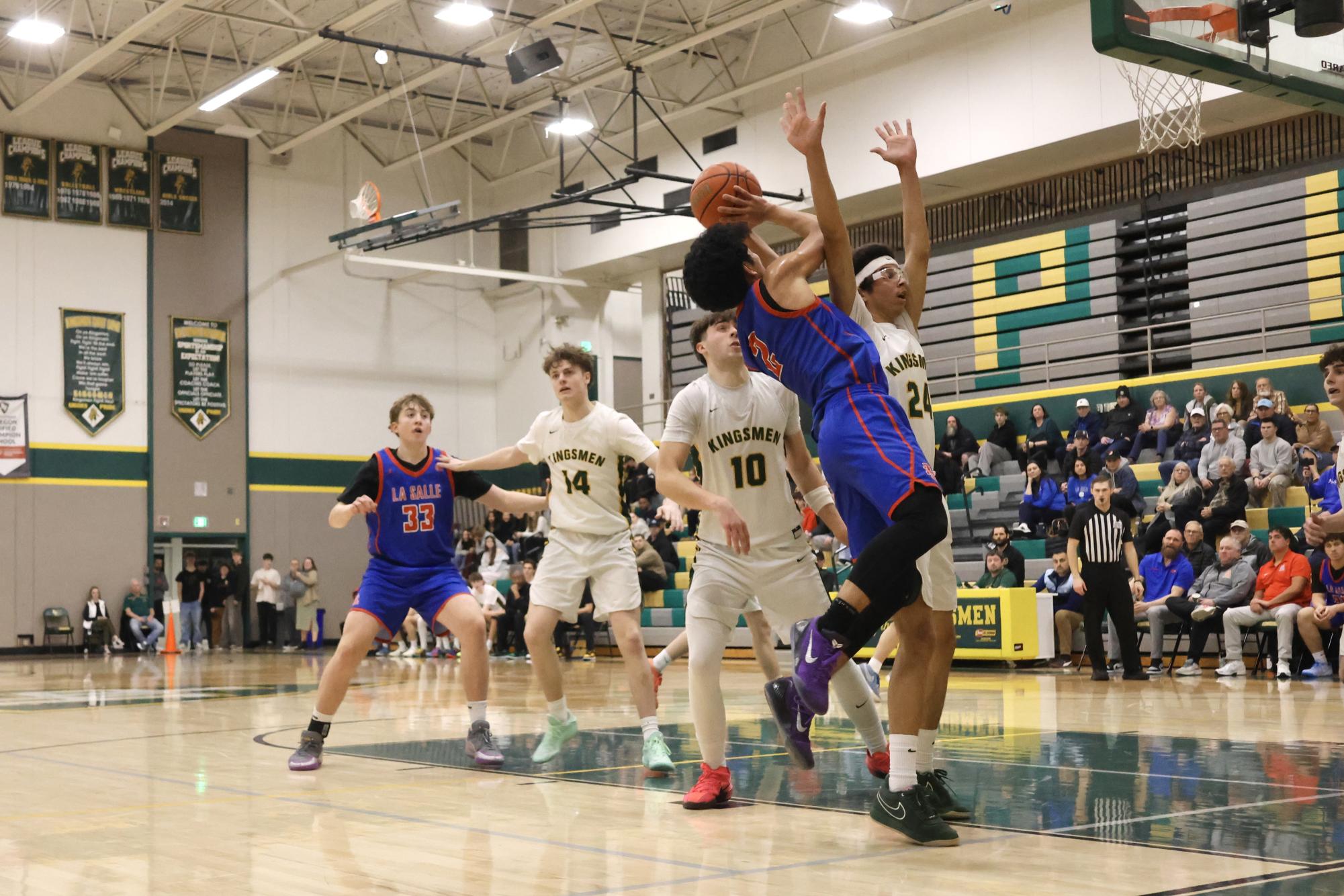 Photo Story: La Salle Boys Basketball Bests Rex Putnam 68-53 on the Road