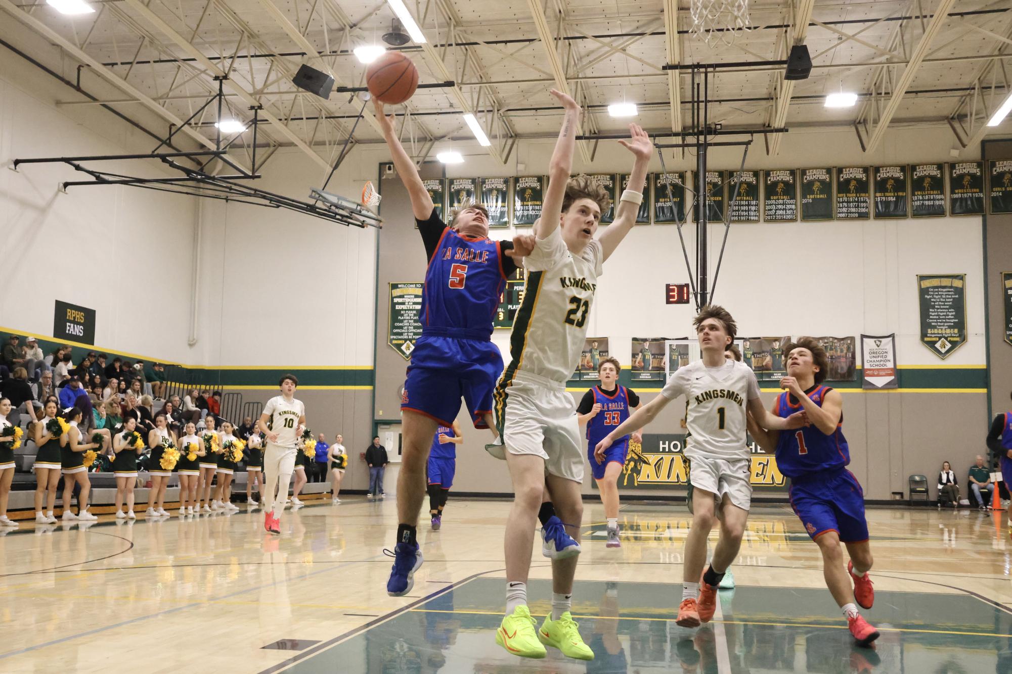 Photo Story: La Salle Boys Basketball Bests Rex Putnam 68-53 on the Road