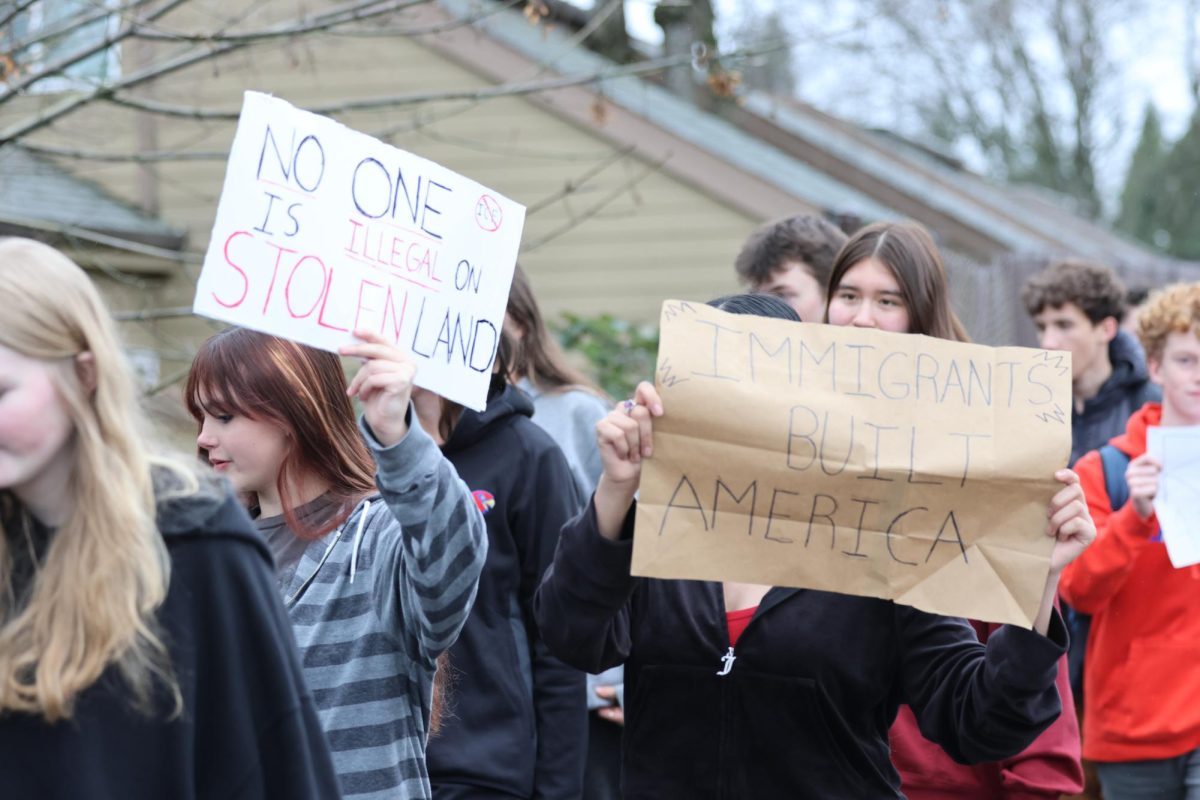 La Salle students participate in a walkout protesting the recent actions of U.S. Immigration and Customs Enforcement agents in a walkout on Friday, Jan. 30. 