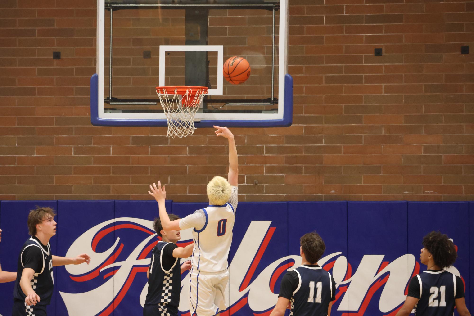 Photo Story: Varsity Boys Basketball Edged Out By Wilsonville in 48-51 loss