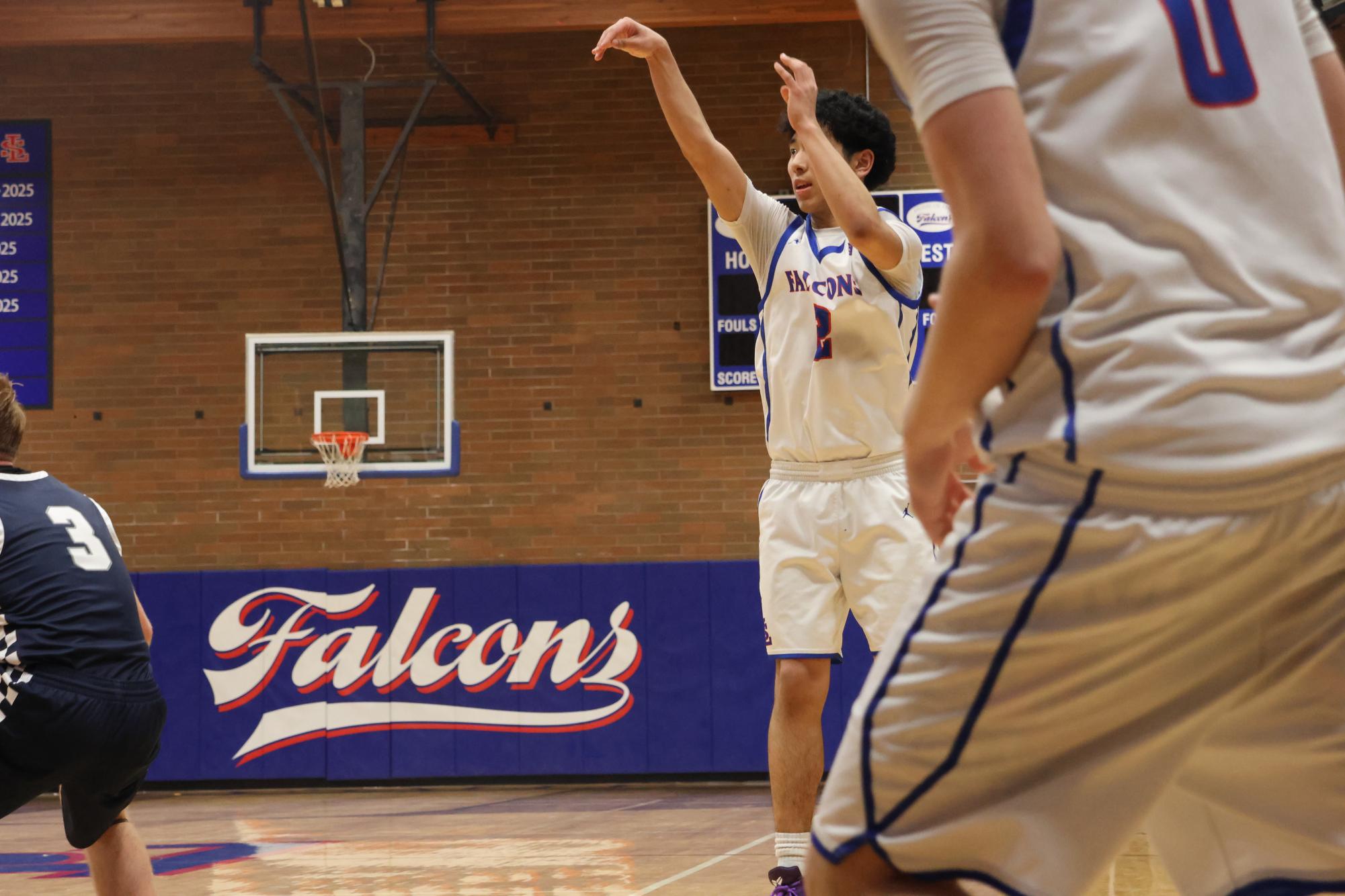 Photo Story: Varsity Boys Basketball Edged Out By Wilsonville in 48-51 loss