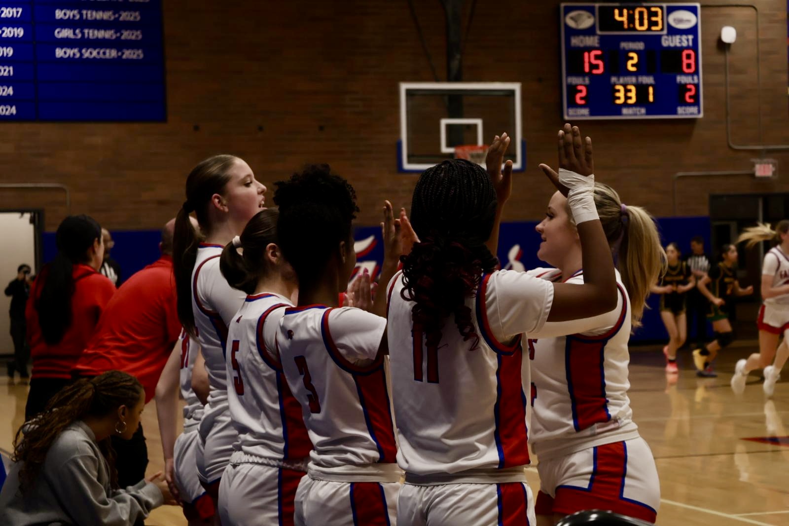 Photo Story: Girls Basketball Rolls Past Rex Putnam in 52–34 Victory