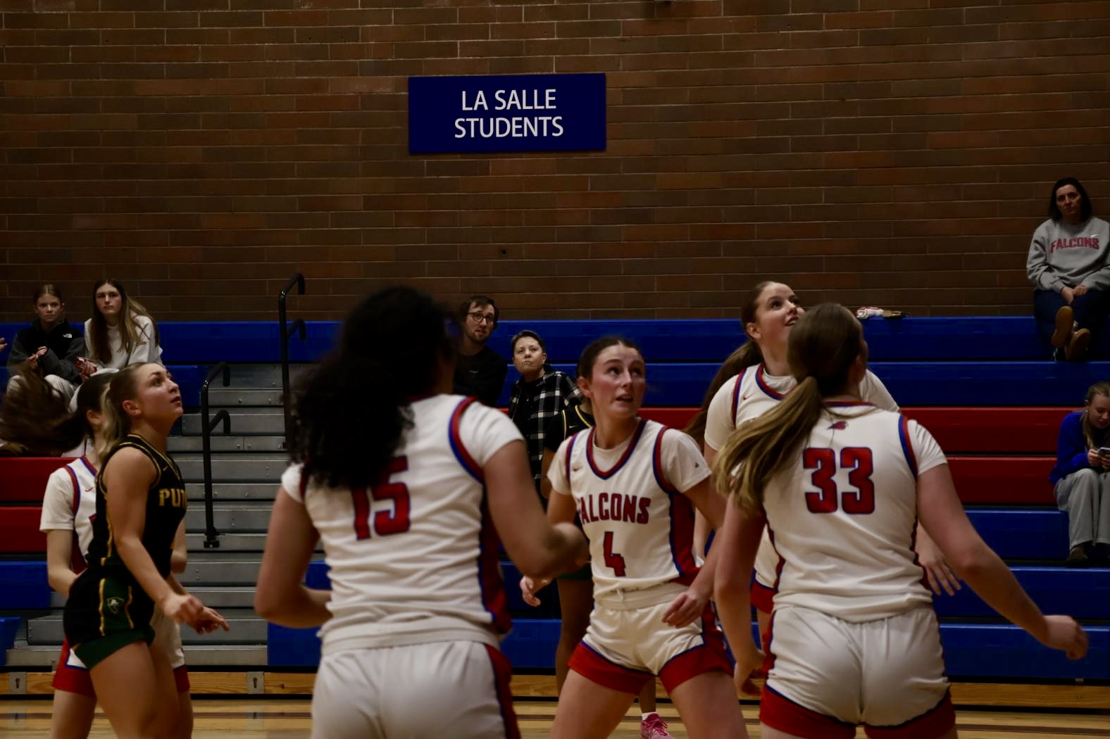 Photo Story: Girls Basketball Rolls Past Rex Putnam in 52–34 Victory