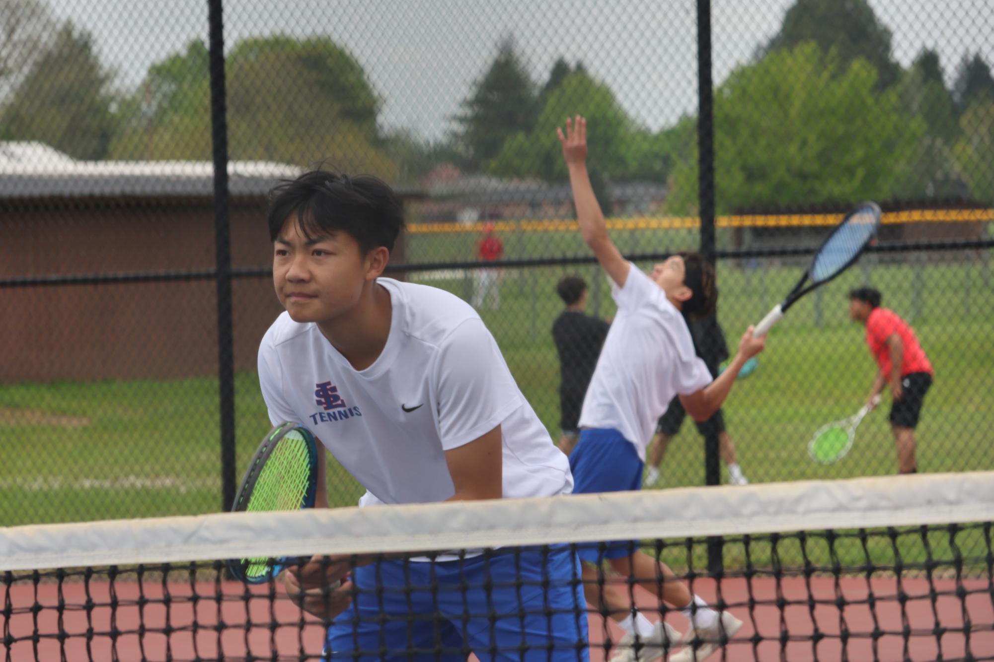 Photo Story: Boys Varsity Tennis Remains Undefeated in League, Winning Against Centennial High School