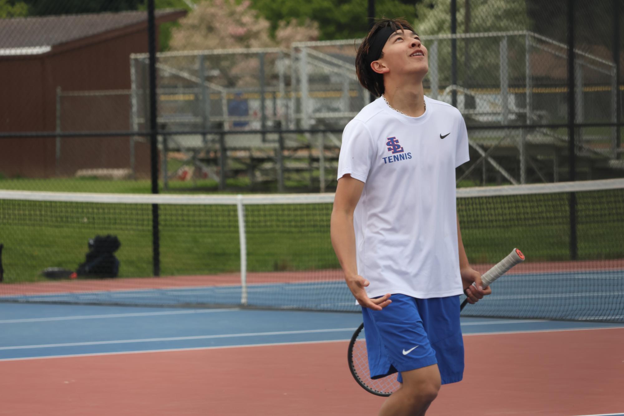 Photo Story: Boys Varsity Tennis Remains Undefeated in League, Winning Against Centennial High School