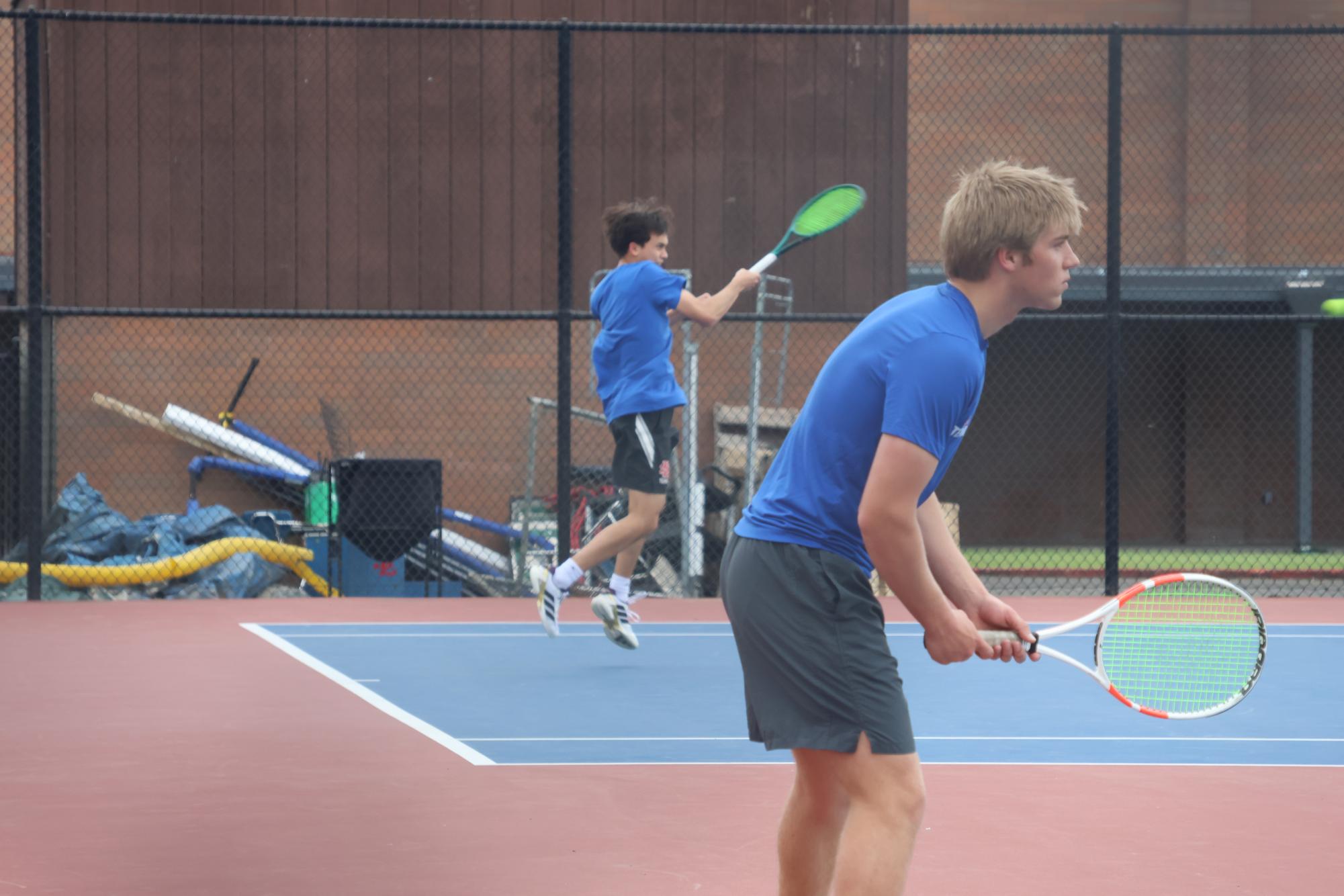 Photo Story: Boys Varsity Tennis Remains Undefeated in League, Winning Against Centennial High School