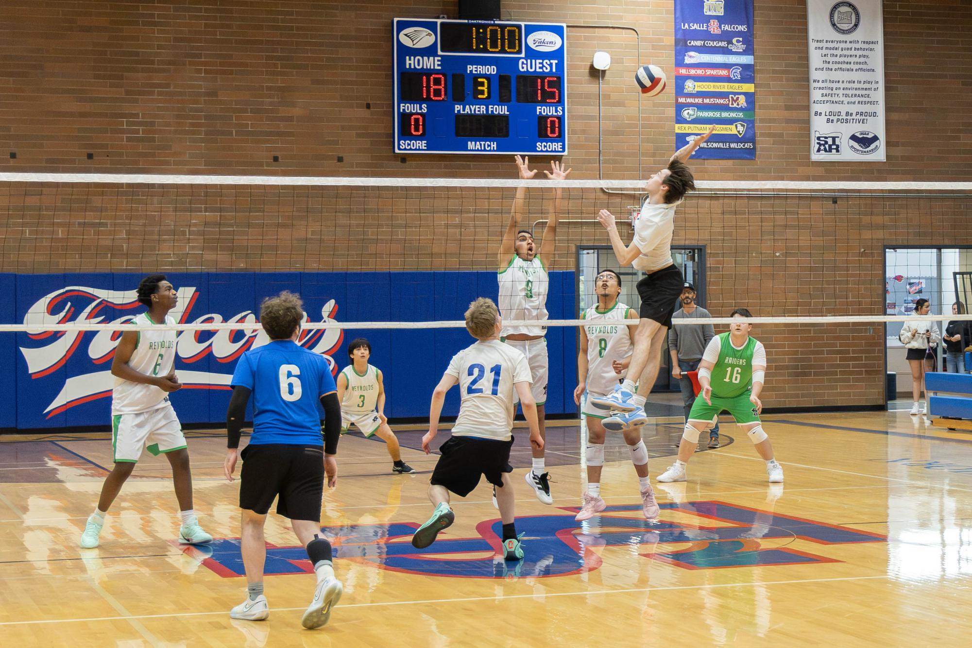 Photo Story: Boys Volleyball Succumbs to Reynolds High School in a Close 3–2 Loss