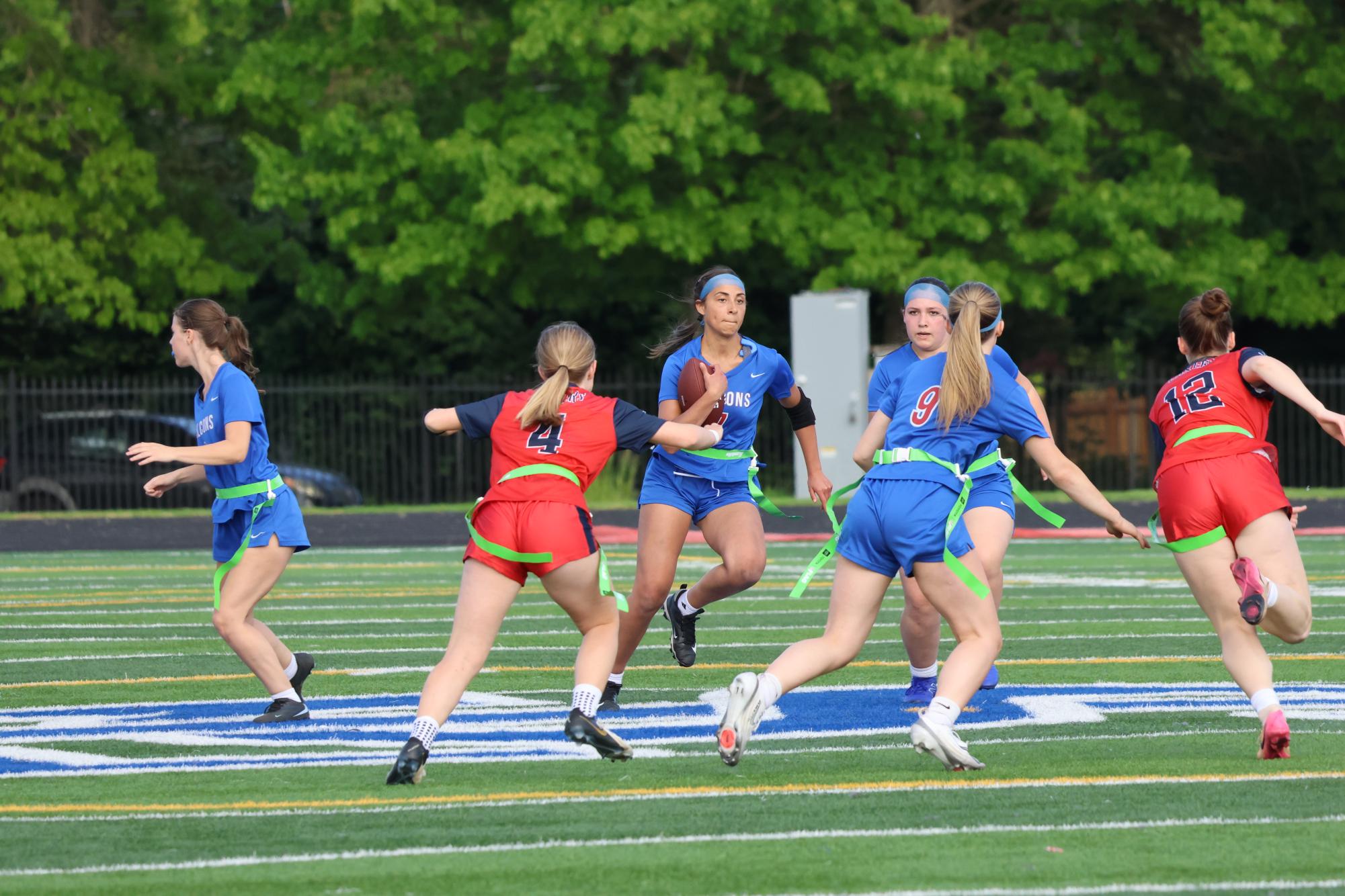 Photo Story: Girls Flag Football Team Sweeps Aside Lakers 13-6 in First Game of Doubleheader