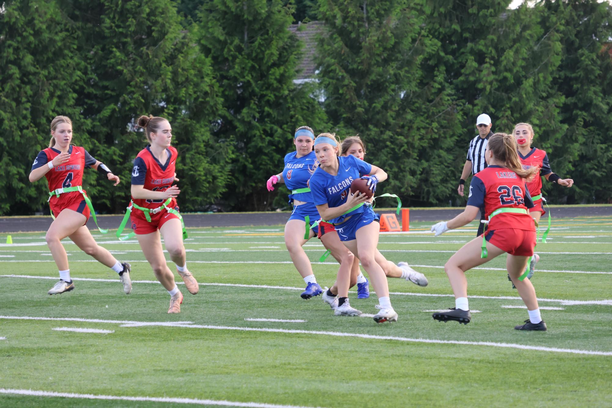 Photo Story: Girls Flag Football Team Sweeps Aside Lakers 13-6 in First Game of Doubleheader