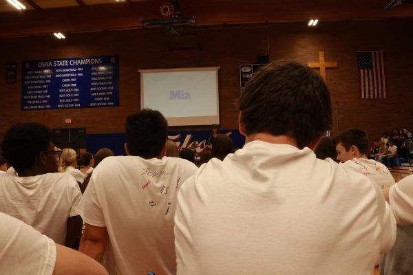 Seniors congregated on the floor in the gym during the talent show for St. La Salle day on Friday, May 29.